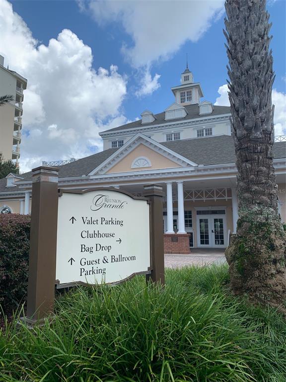 1172 Castle Pines Court Reunion, FL 34747 - Photo 57 of 65 a view of a building with a sign on it