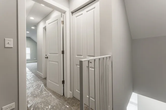 a bathroom with a shower and a toilet