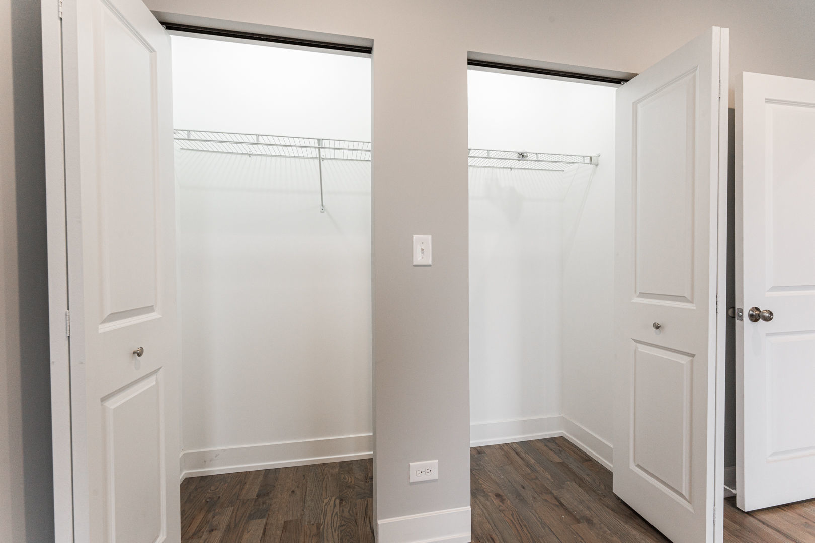 926 West 32nd Place, Unit 2F Chicago, IL 60608 - Photo 8 of 18 a view of walk in closet with wooden floor