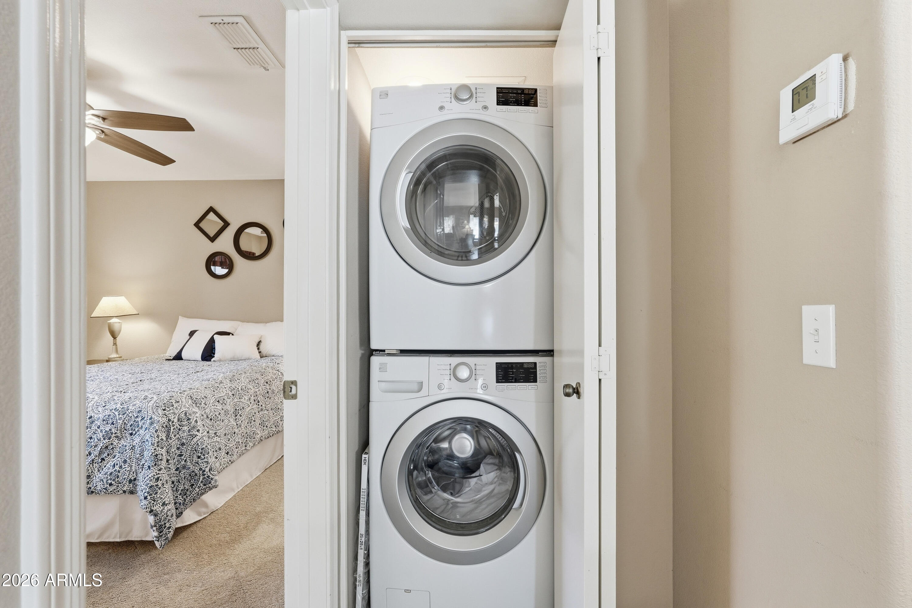14300 West Bell Road, Unit 387 Surprise, AZ 85374 - Photo 14 of 18 a room with a washer and dryer