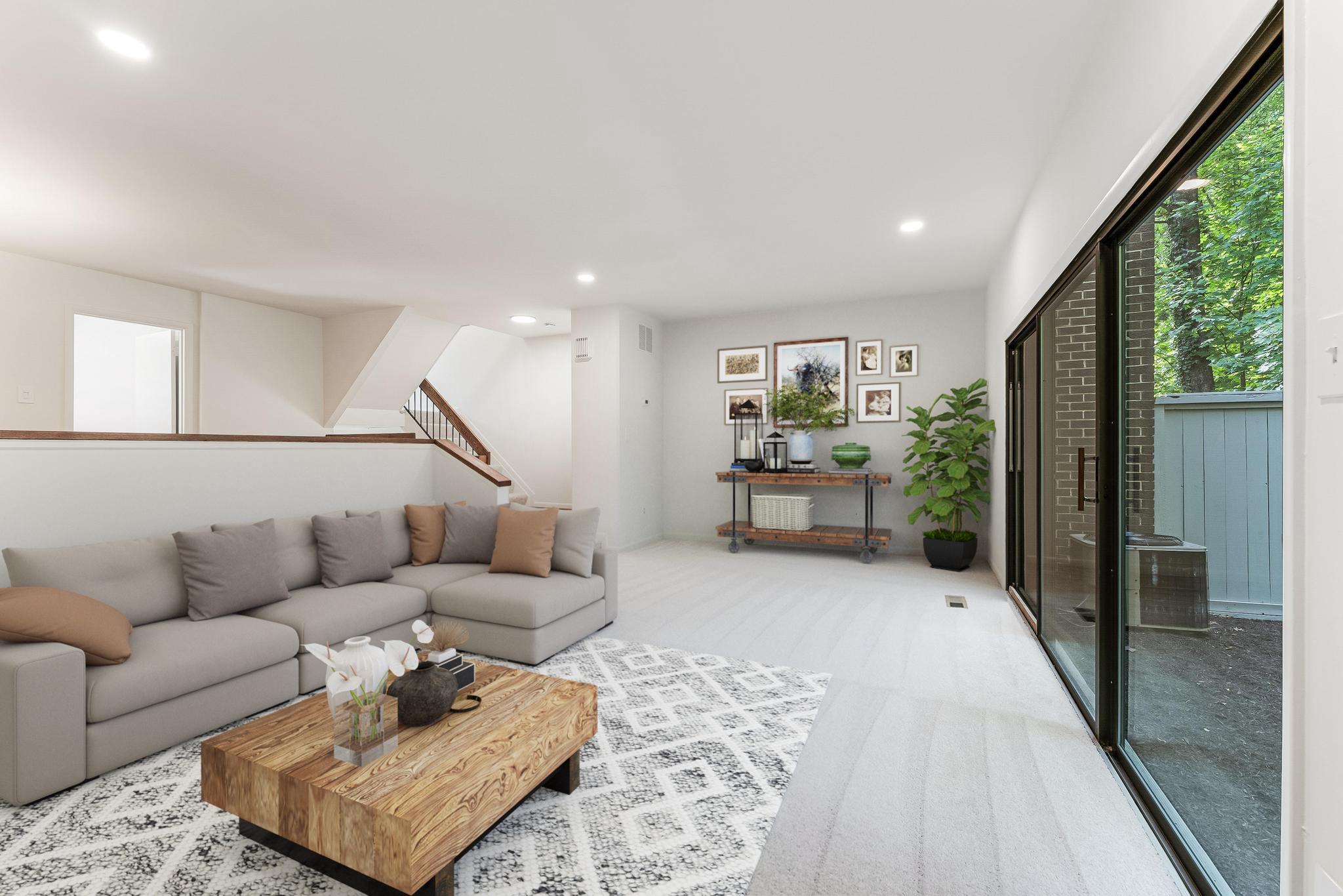 12023 Insha Court Reston, VA 20191 - Photo 28 of 52 a living room with furniture and a large window