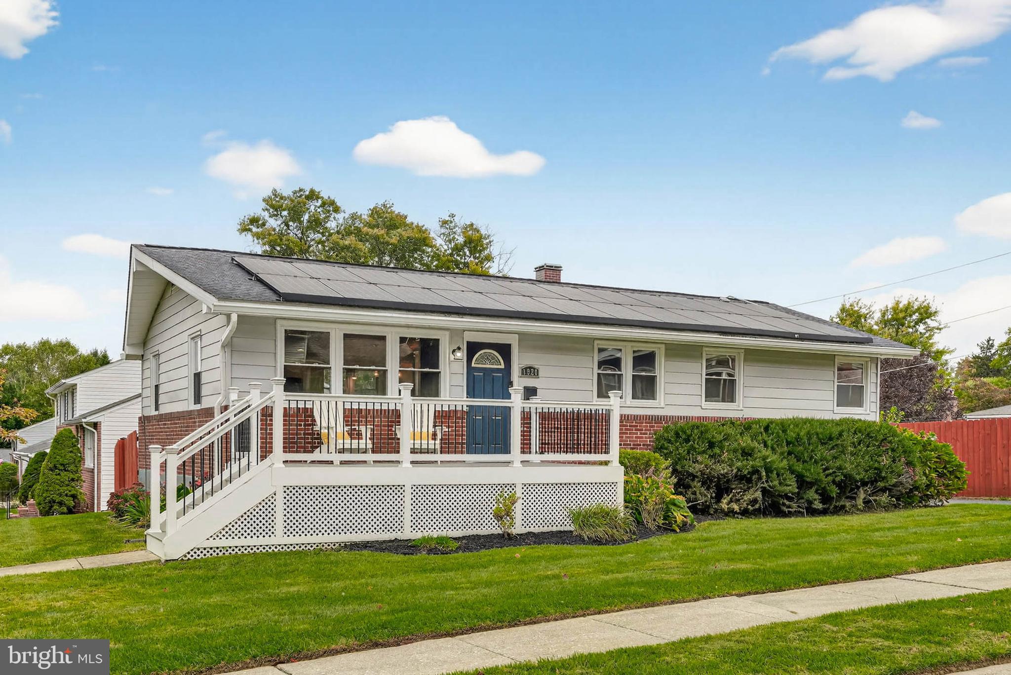 a house with garden in front of it