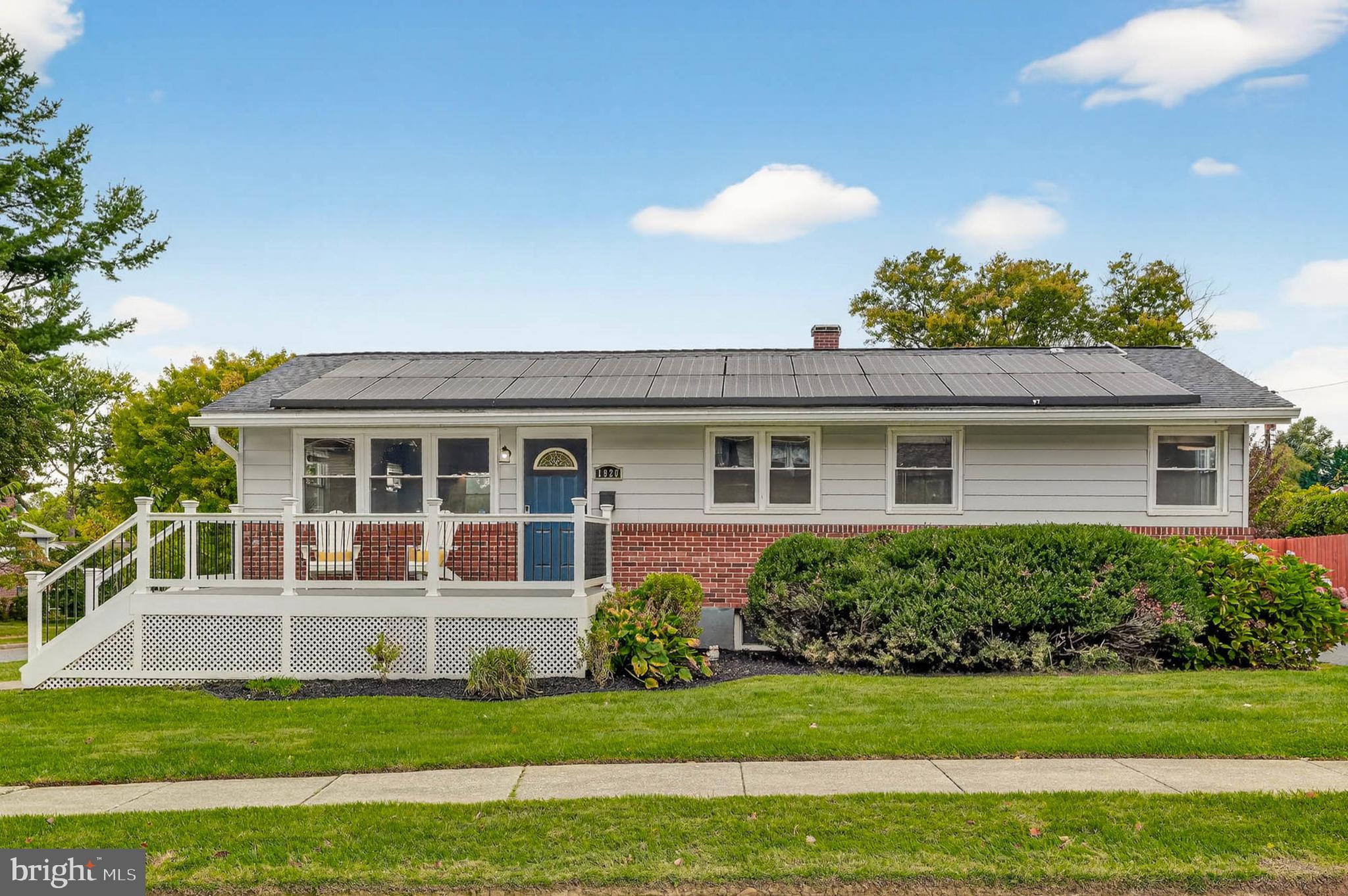 1920 Drummond Road Catonsville, MD 21228 - Photo 2 of 45 a front view of a house with a garden