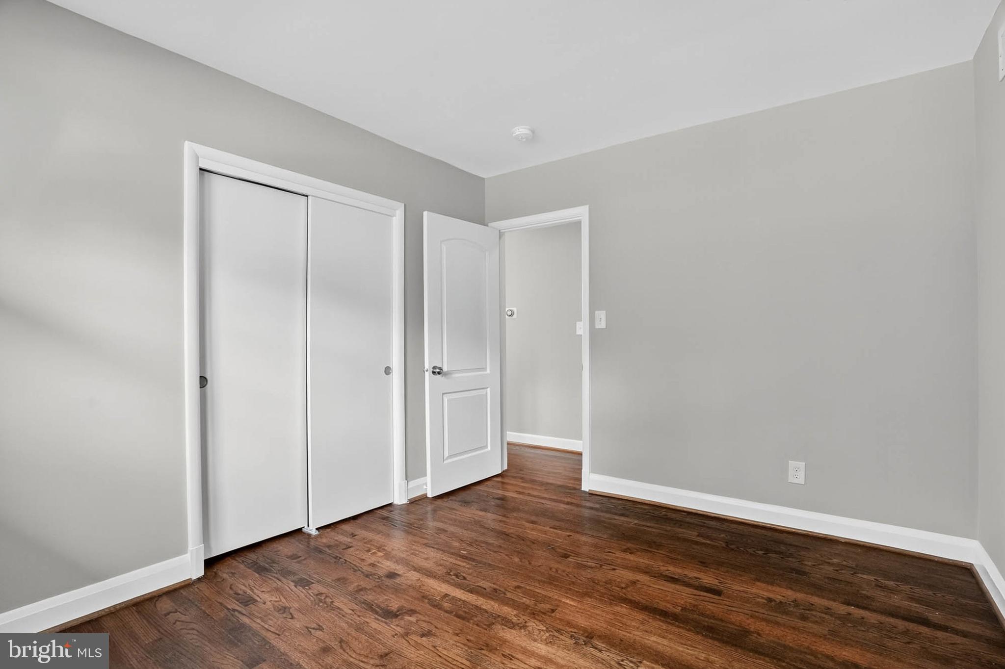1920 Drummond Road Catonsville, MD 21228 - Photo 21 of 45 a view of an empty room with wooden floor