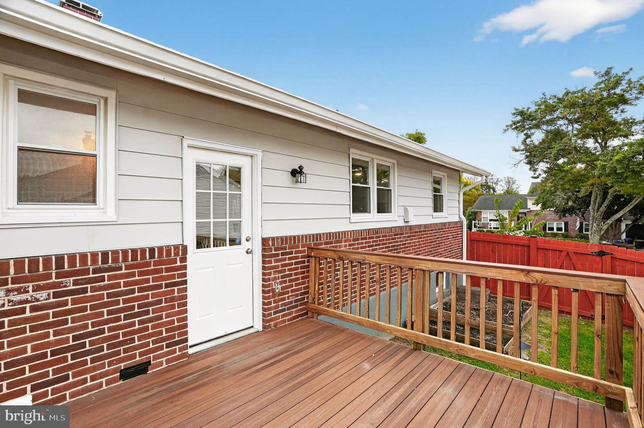 1920 Drummond Road Catonsville, MD 21228 - Photo 35 of 45 a view of a house with a deck