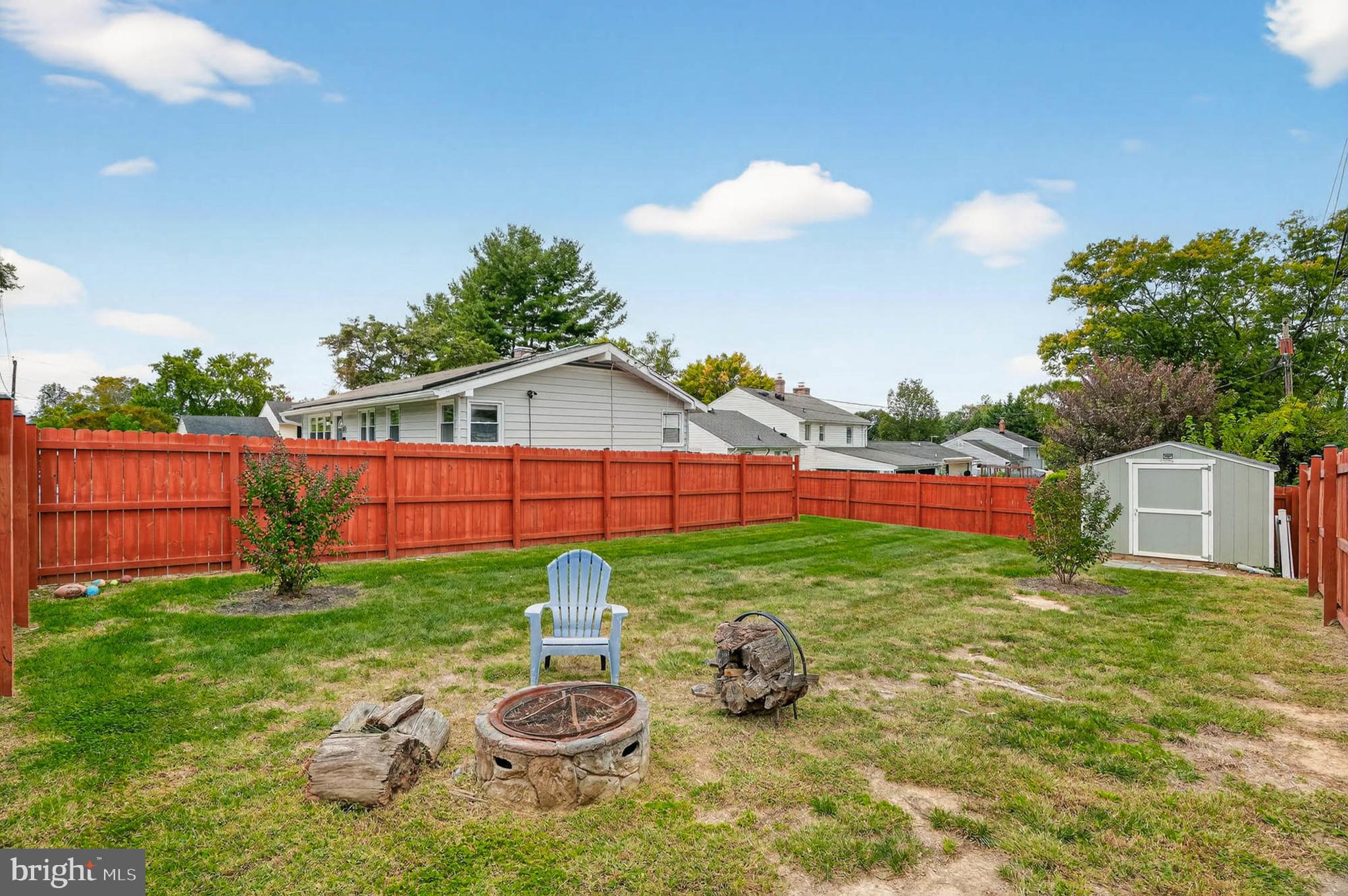 1920 Drummond Road Catonsville, MD 21228 - Photo 37 of 45 a view of a backyard with table and chairs and potted plants