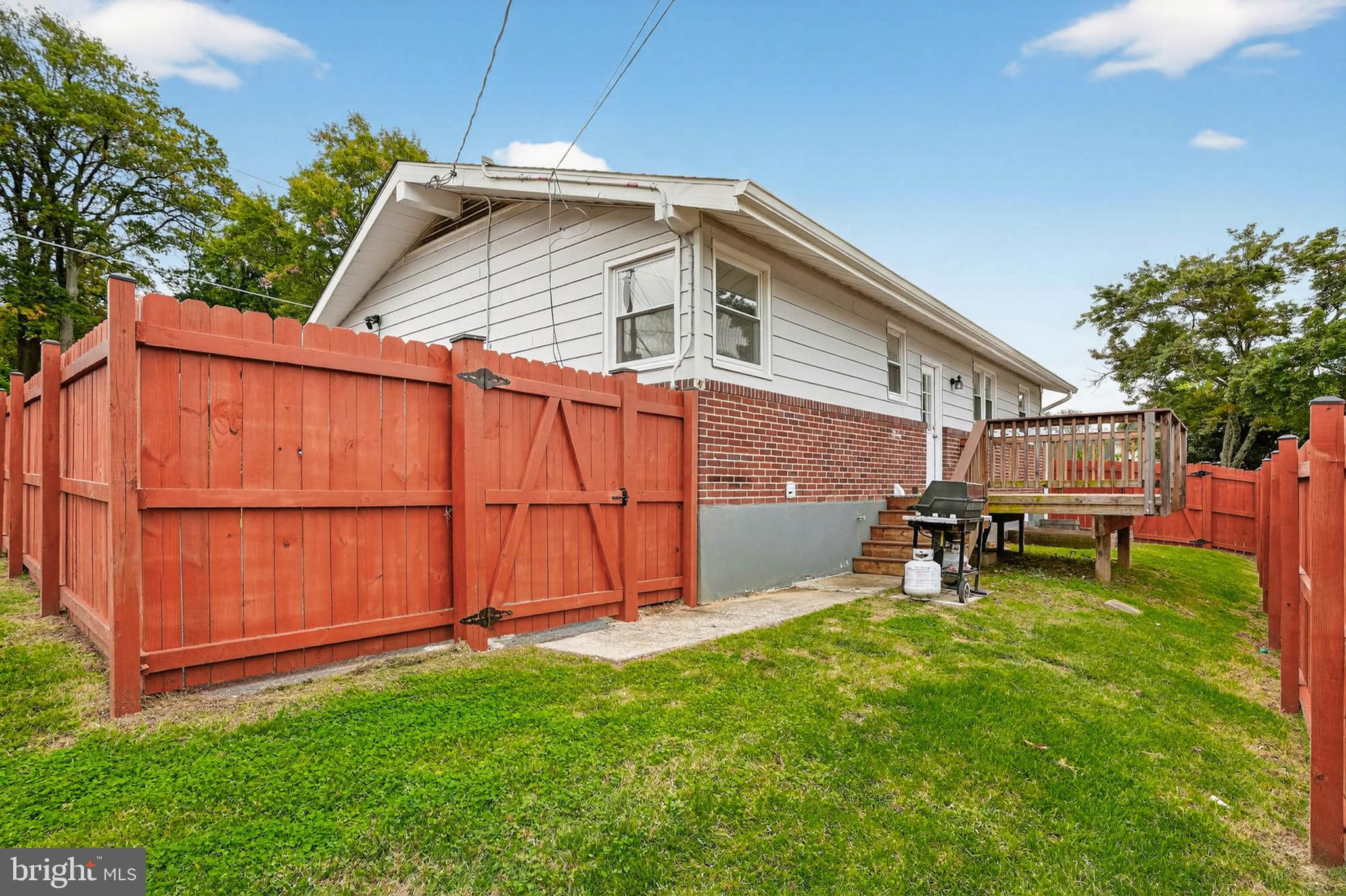 1920 Drummond Road Catonsville, MD 21228 - Photo 40 of 45 a backyard of a house with table and chairs