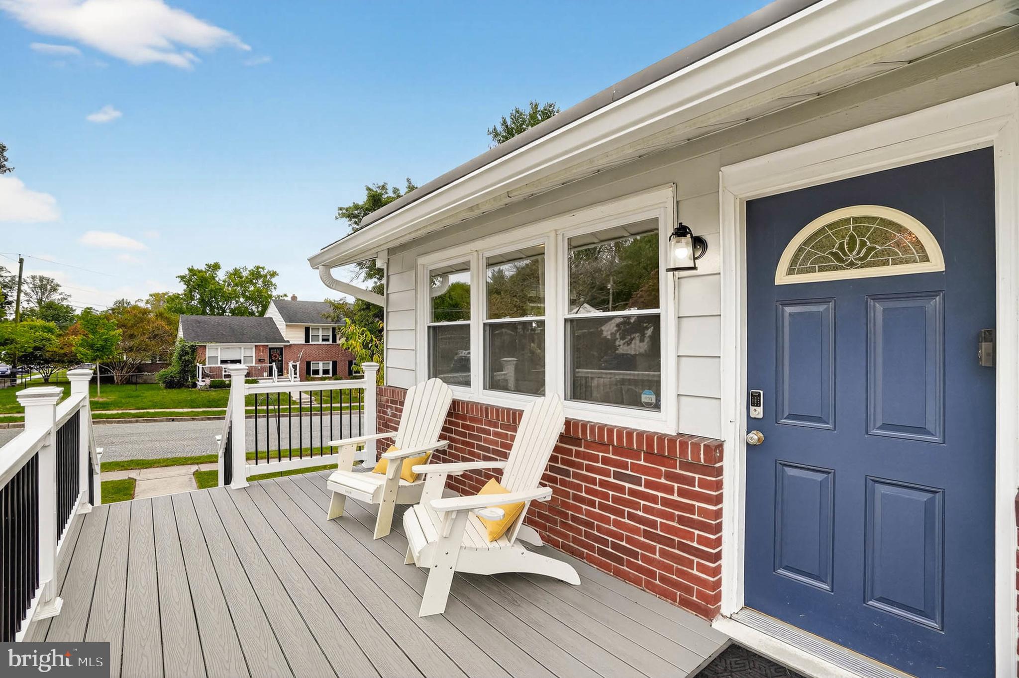 1920 Drummond Road Catonsville, MD 21228 - Photo 4 of 45 a roof deck with a table and chairs