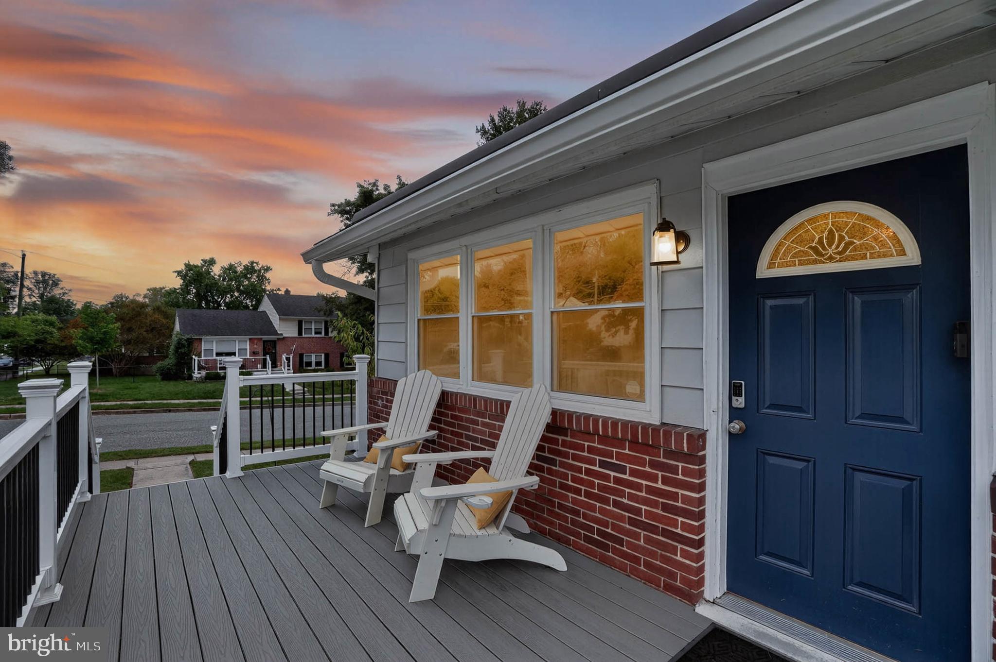 1920 Drummond Road Catonsville, MD 21228 - Photo 42 of 45 a view of a balcony with wooden floor and iron fence
