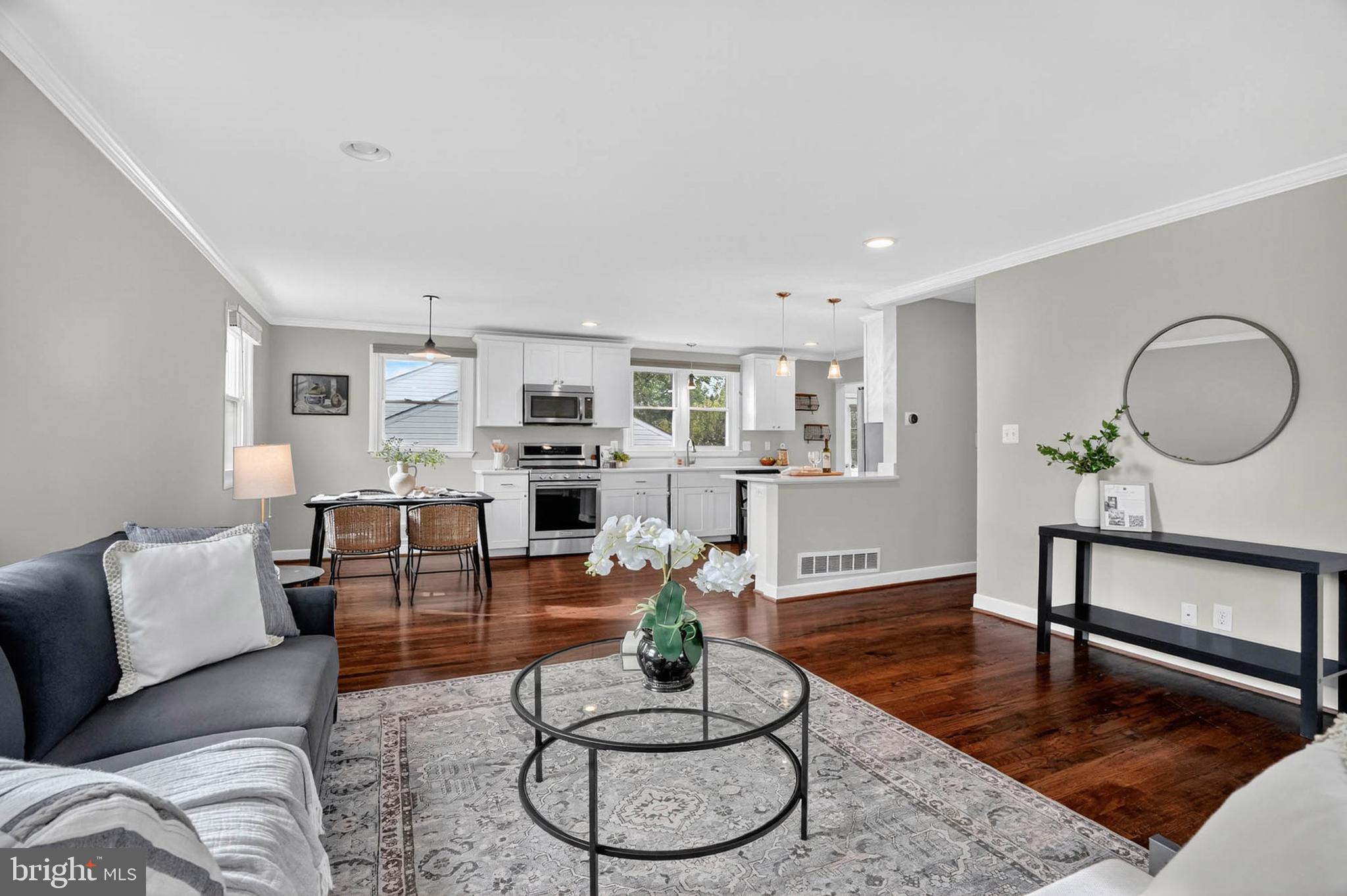 1920 Drummond Road Catonsville, MD 21228 - Photo 8 of 45 a living room with furniture a rug and kitchen view