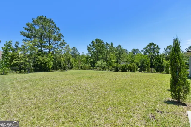a view of outdoor space and yard