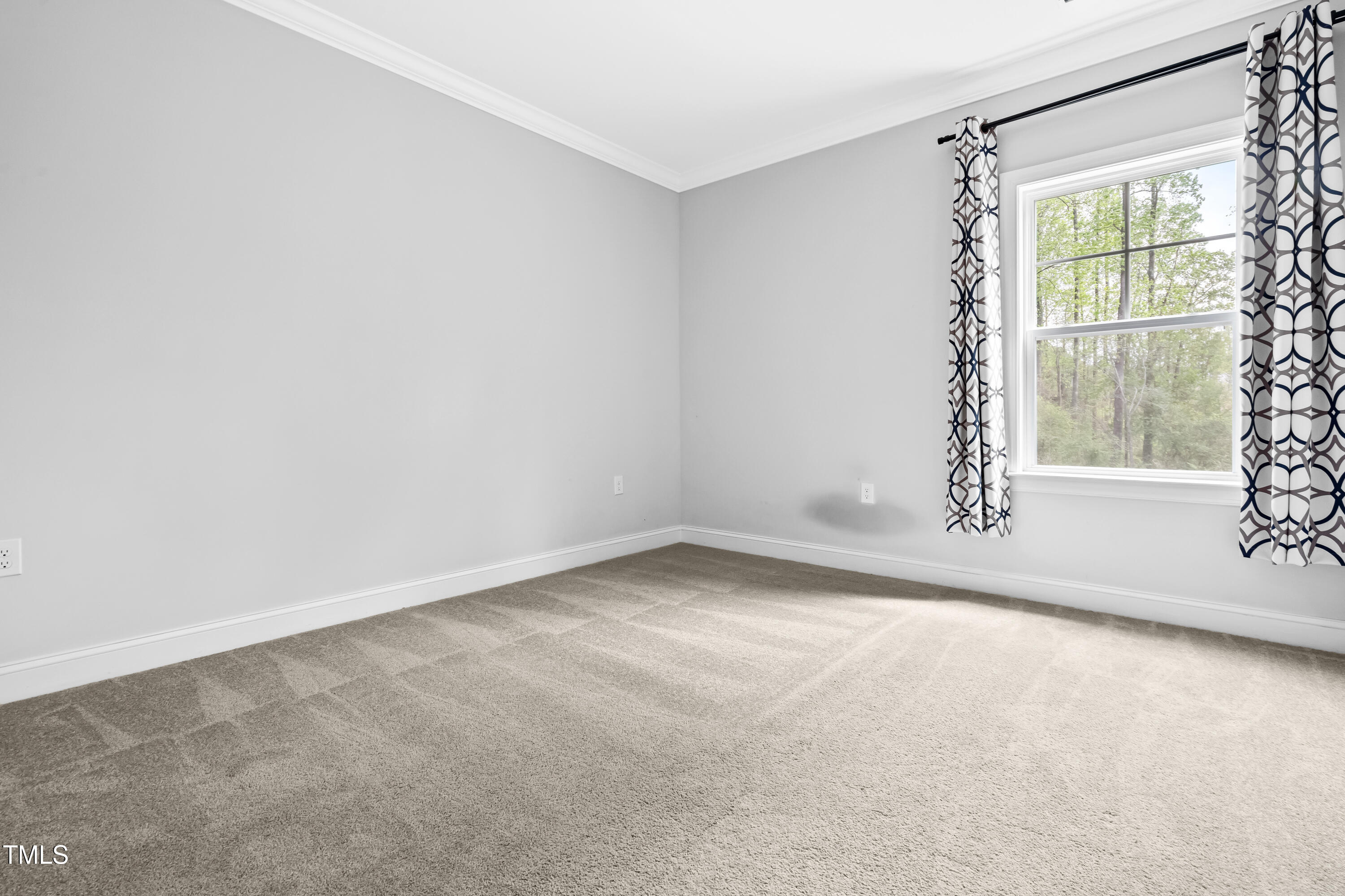 270 Trailing Blf Way Garner, NC 27529 - Photo 20 of 41 an empty room with a window