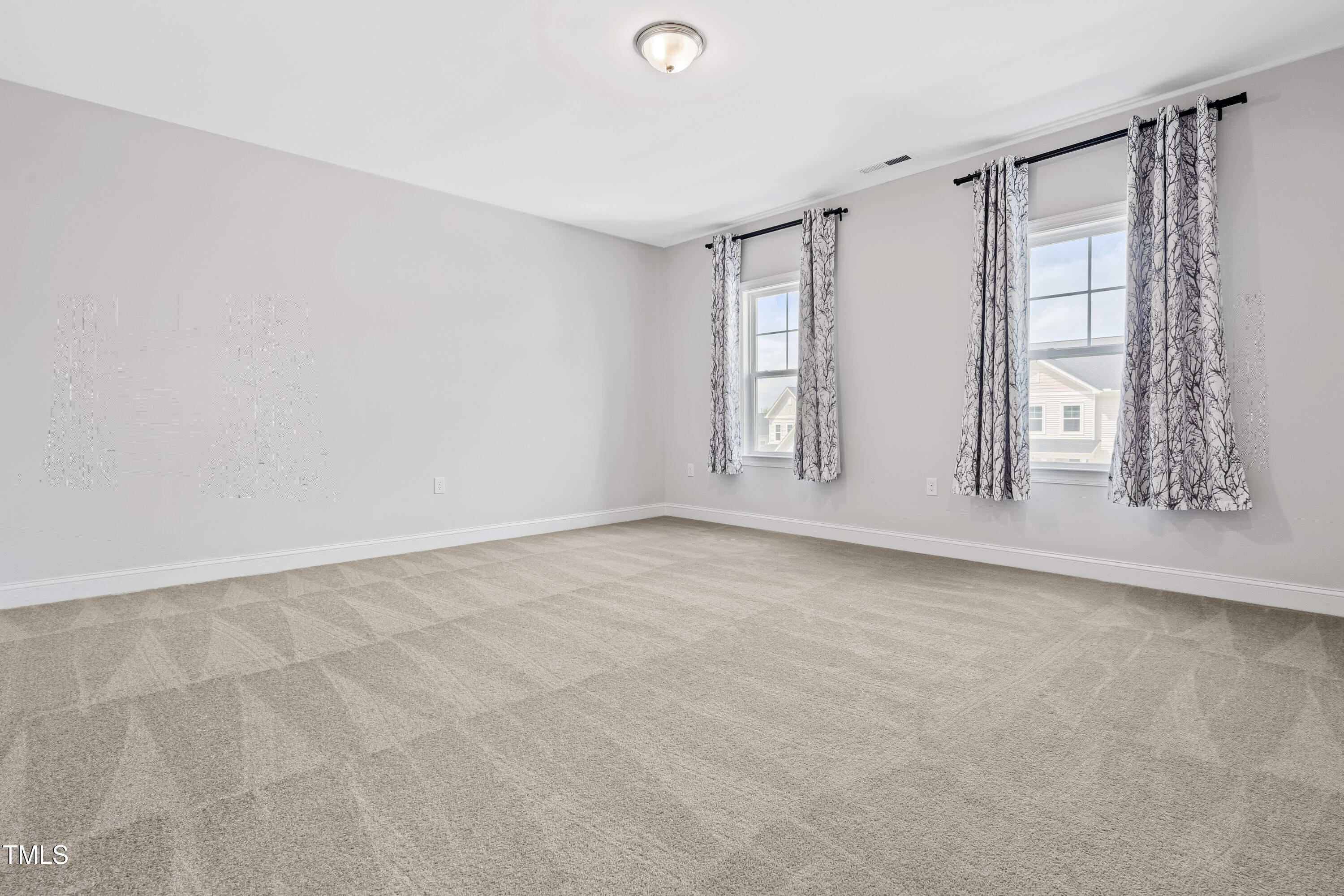 270 Trailing Blf Way Garner, NC 27529 - Photo 23 of 41 a view of an empty room with a window