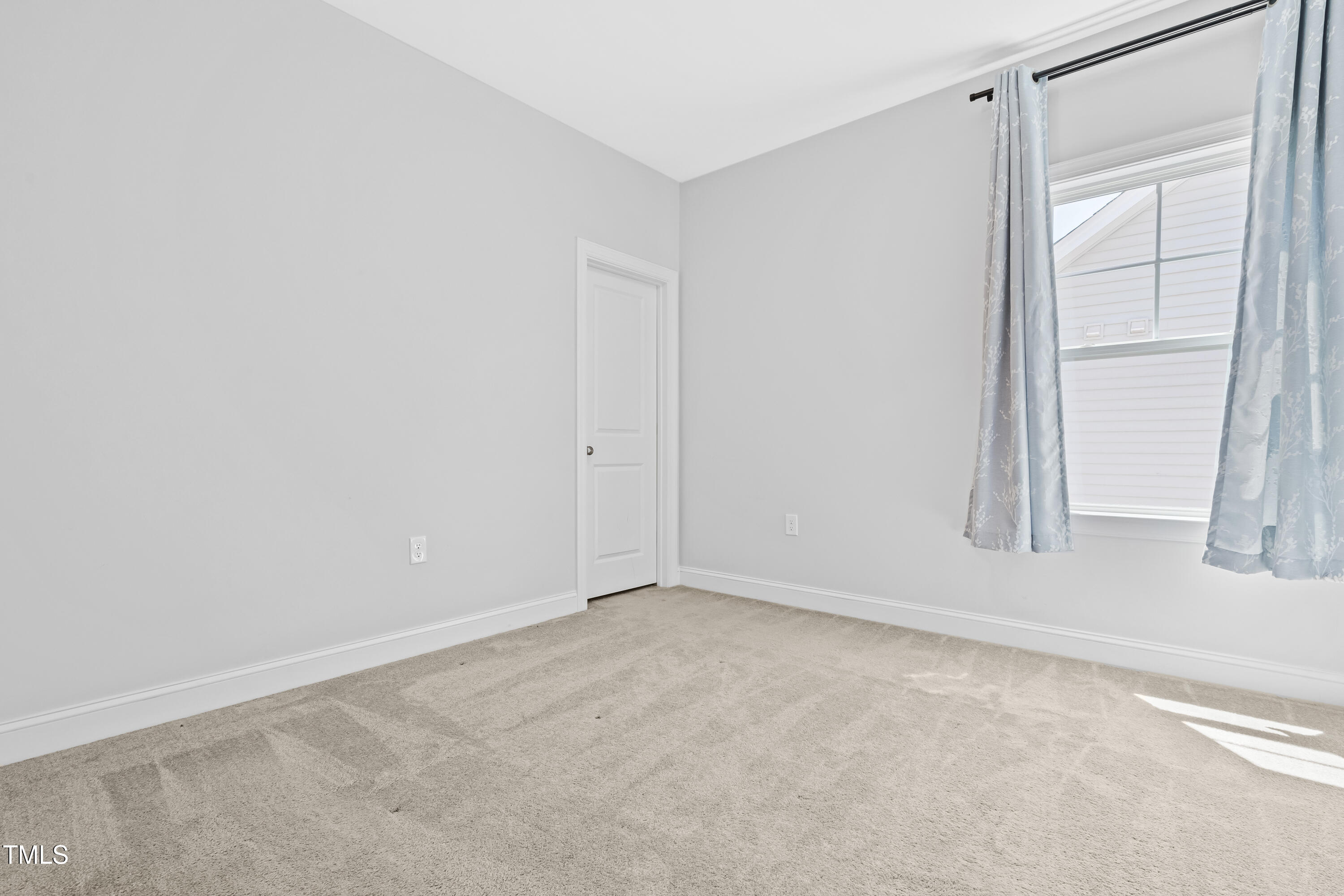 270 Trailing Blf Way Garner, NC 27529 - Photo 27 of 41 an empty room with windows