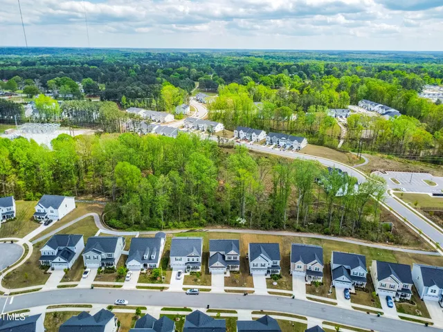 a view of yard with swimming pool and outdoor seating