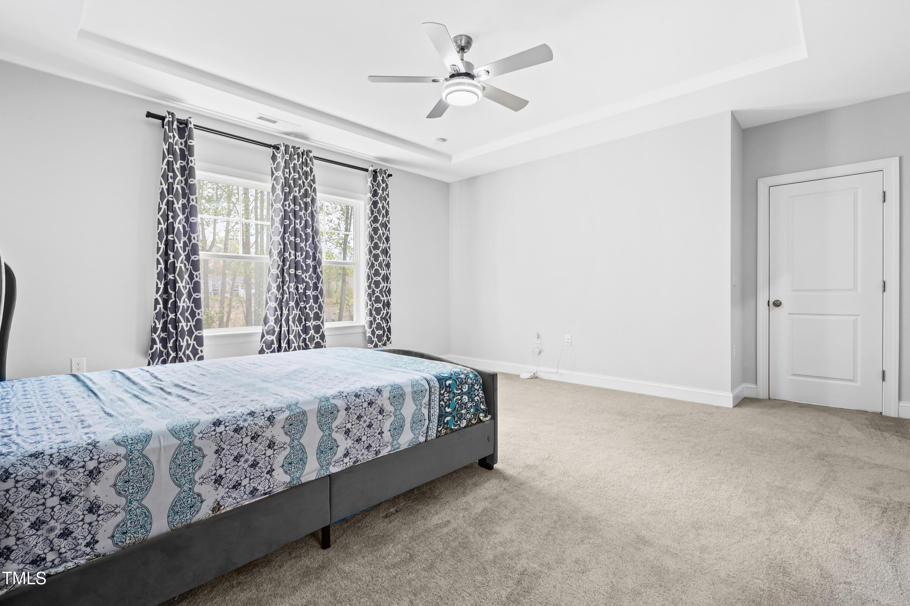 270 Trailing Blf Way Garner, NC 27529 - Photo 31 of 41 a bedroom with a bed and a ceiling fan