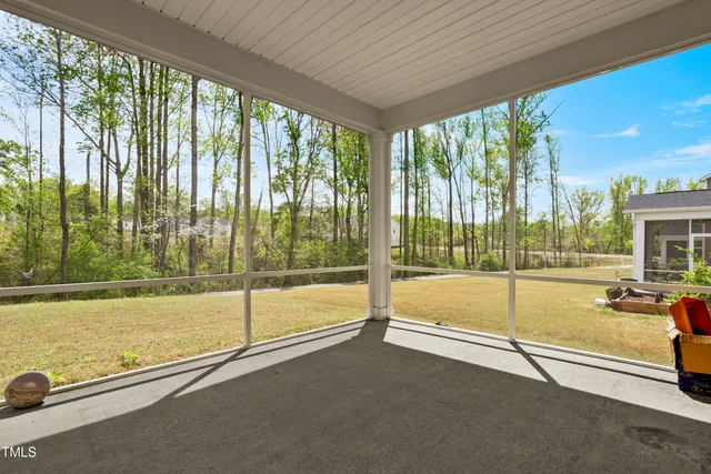a view of a room with a large window