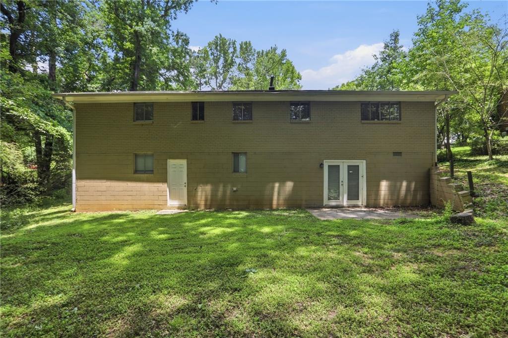 4505 Wonder Valley Trail Decatur, GA 30034 - Photo 30 of 34 a front view of a house with a yard