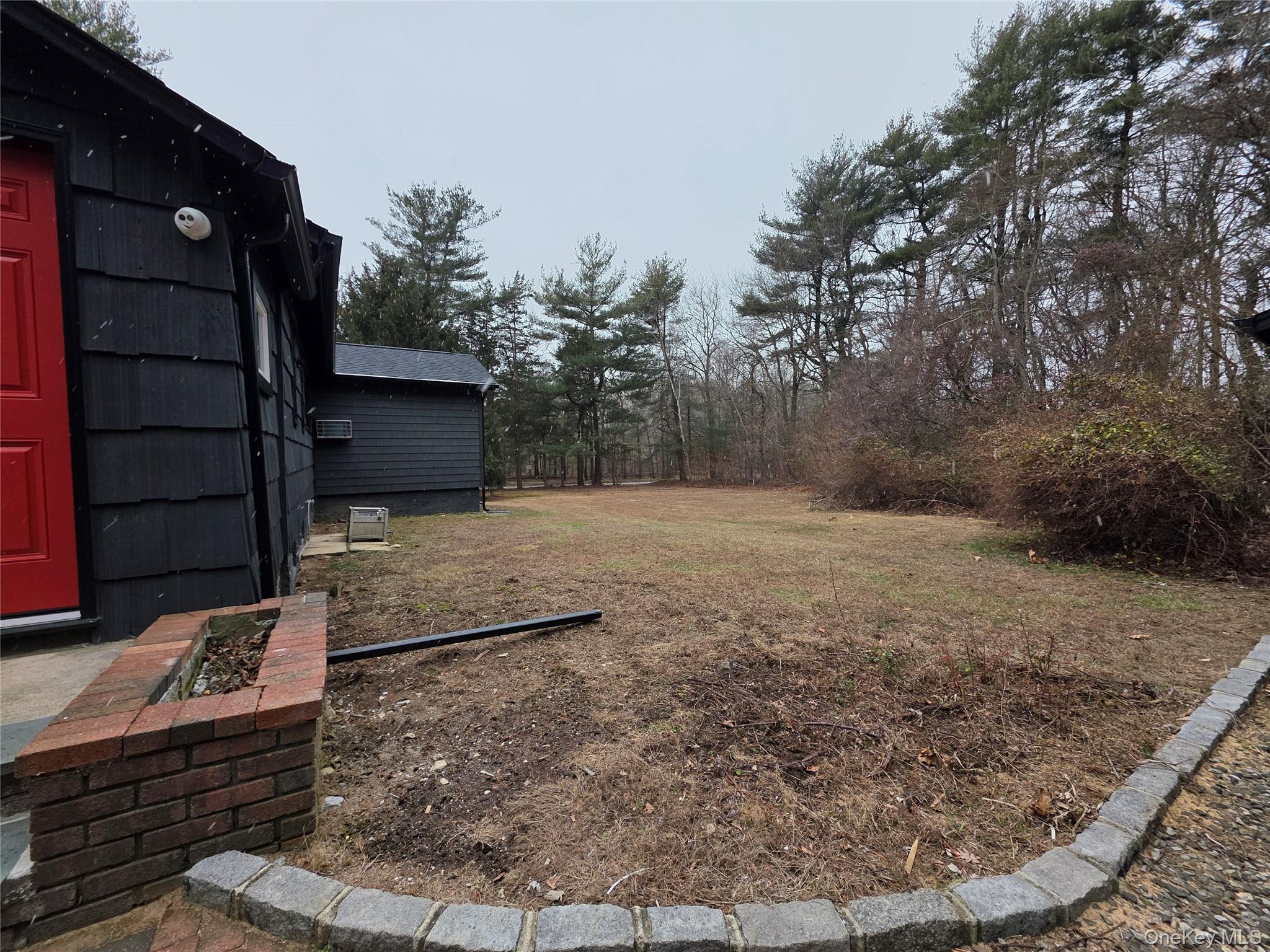200 Deforest Road Dix Hills, NY 11746 - Photo 19 of 20 a view of a backyard with pathway
