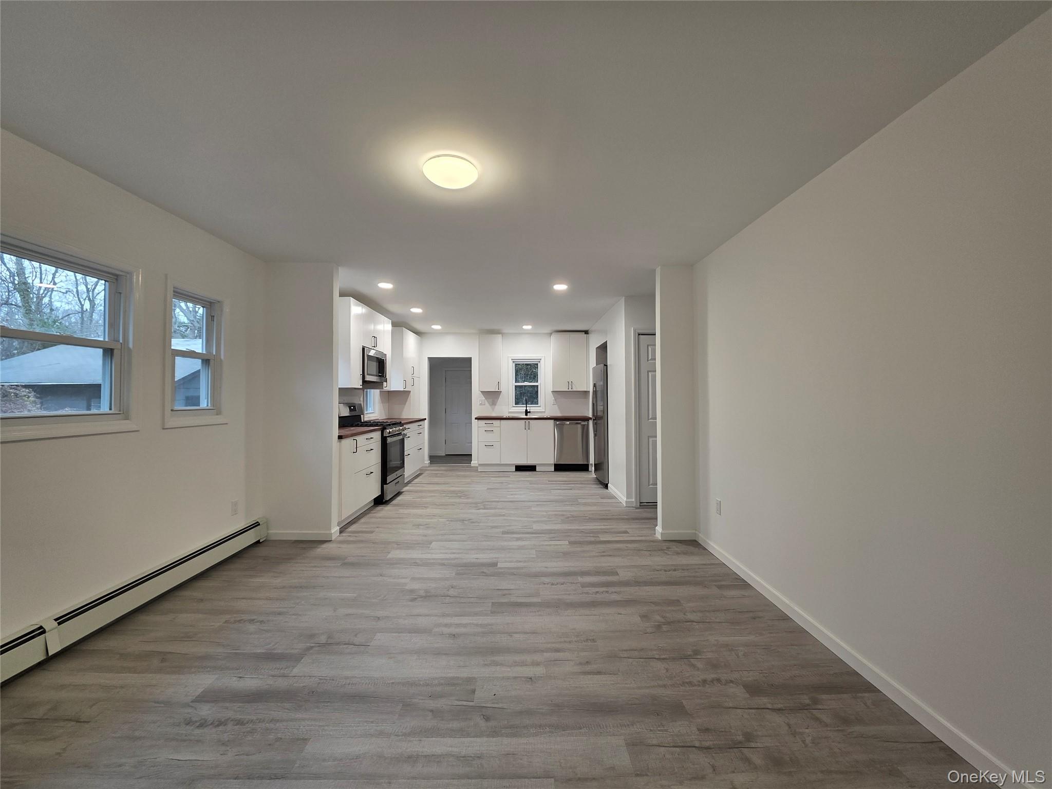 200 Deforest Road Dix Hills, NY 11746 - Photo 4 of 20 a view of a kitchen with a sink