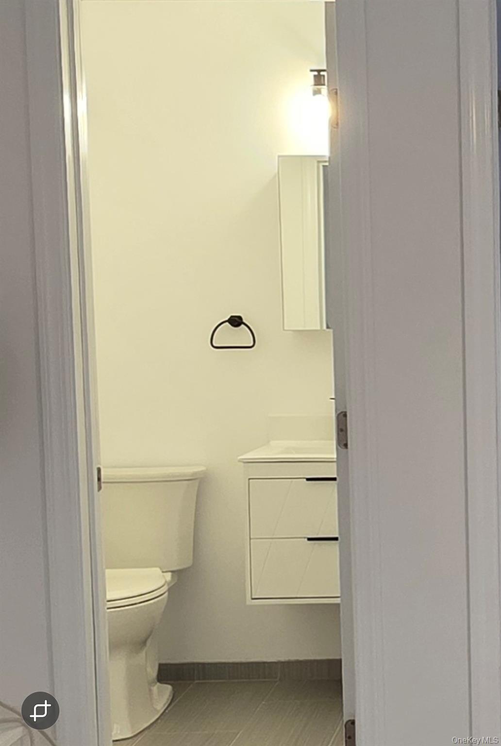 200 Deforest Road Dix Hills, NY 11746 - Photo 8 of 20 a bathroom with a toilet