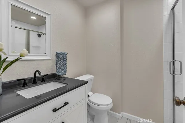 a bathroom with a sink and a toilet
