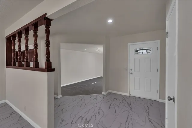 wooden floor with staircase