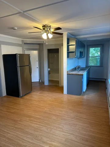 a view of a livingroom with a furniture