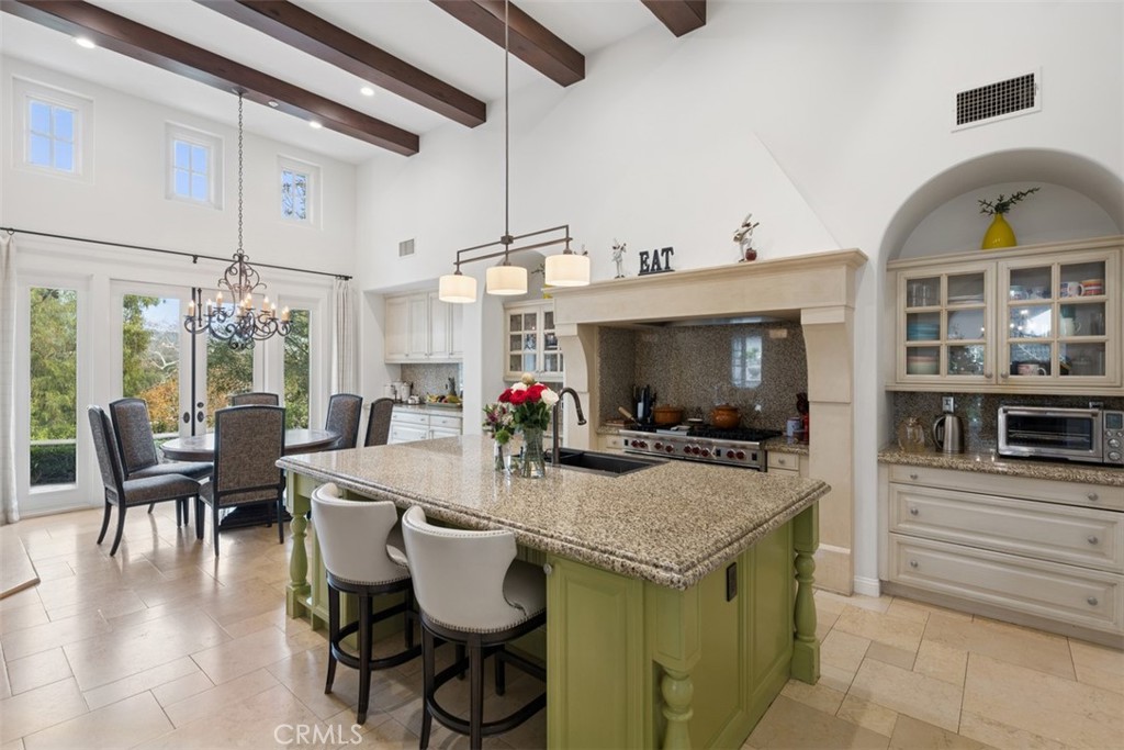25 Wild Hawk Irvine, CA 92603 - Photo 11 of 36 a view of a dining room with furniture window and outside view