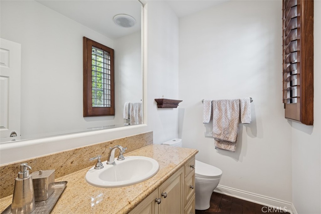 25 Wild Hawk Irvine, CA 92603 - Photo 16 of 36 a bathroom with a sink toilet and shower