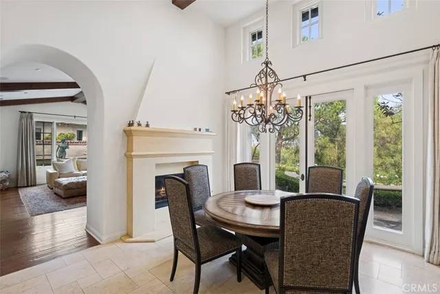 a view of a patio with table and chairs