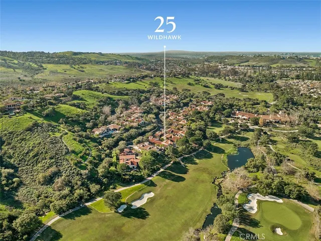 a view of a lake with a yard