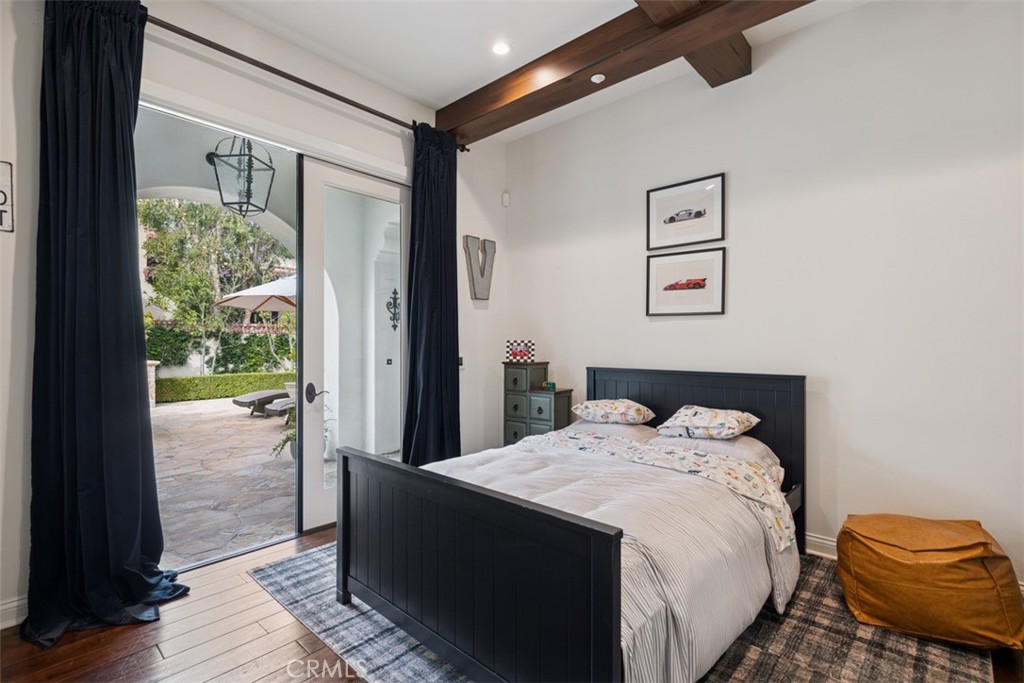 25 Wild Hawk Irvine, CA 92603 - Photo 29 of 36 a bedroom with a bed and a window