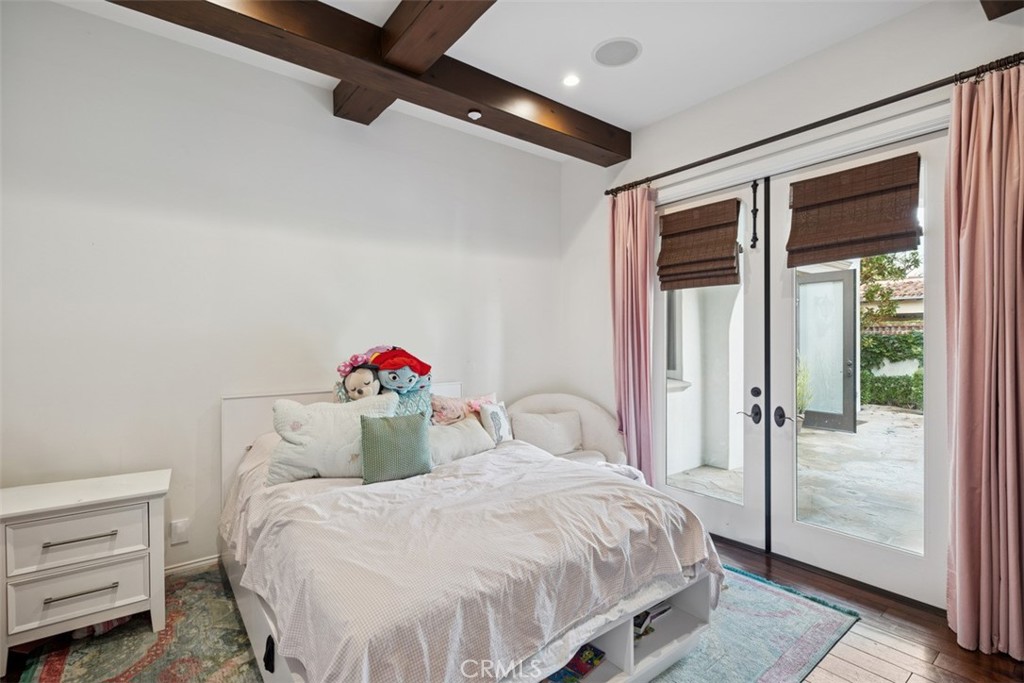 25 Wild Hawk Irvine, CA 92603 - Photo 31 of 36 a bedroom with a bed and a window