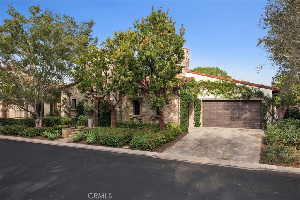 25 Wild Hawk Irvine, CA 92603 - Photo 4 of 36 front view of a house with a street