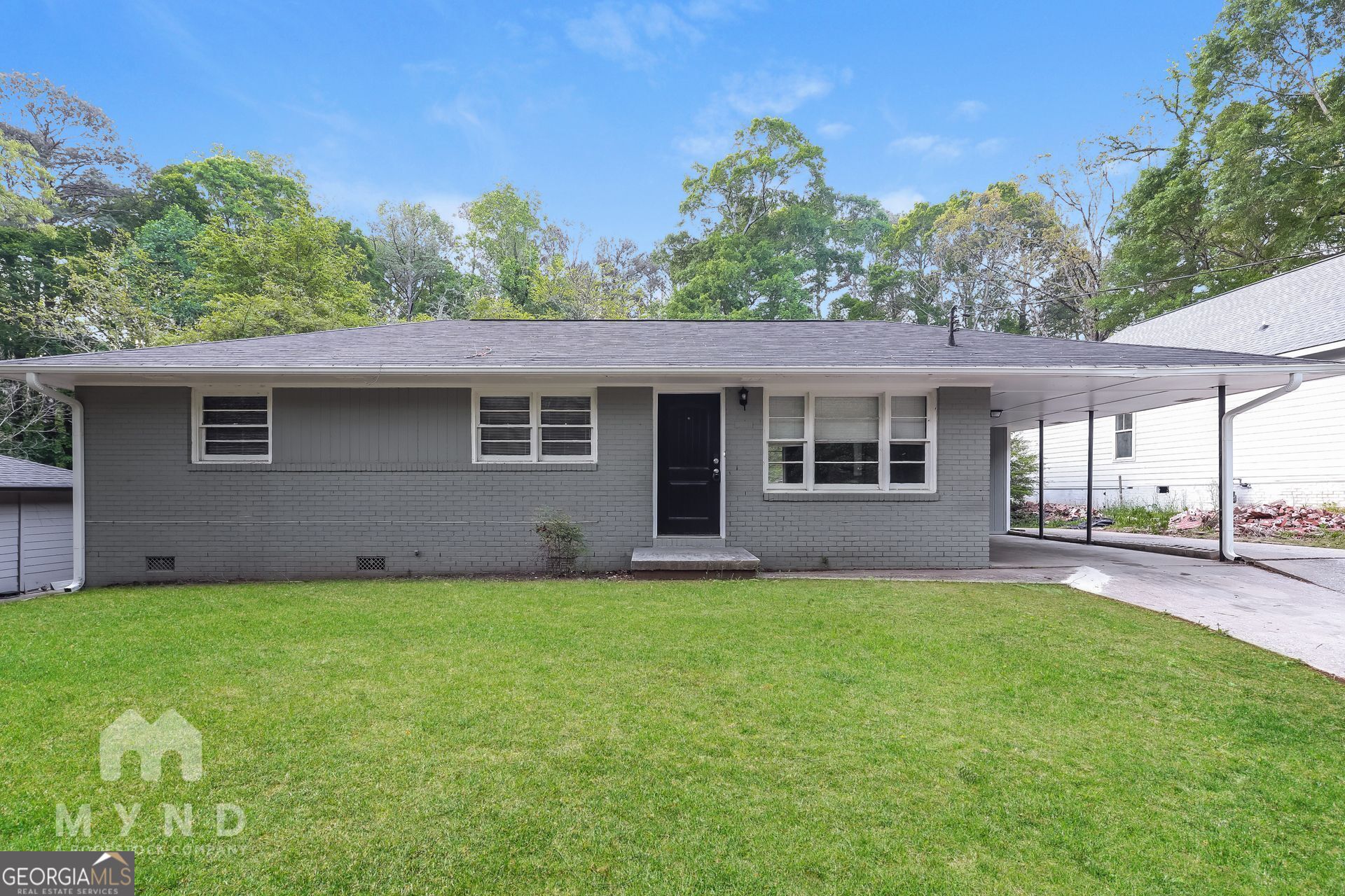 2644 Butner Road Atlanta, GA 30331 - Photo 1 of 21 a view of a house with a yard and a large tree
