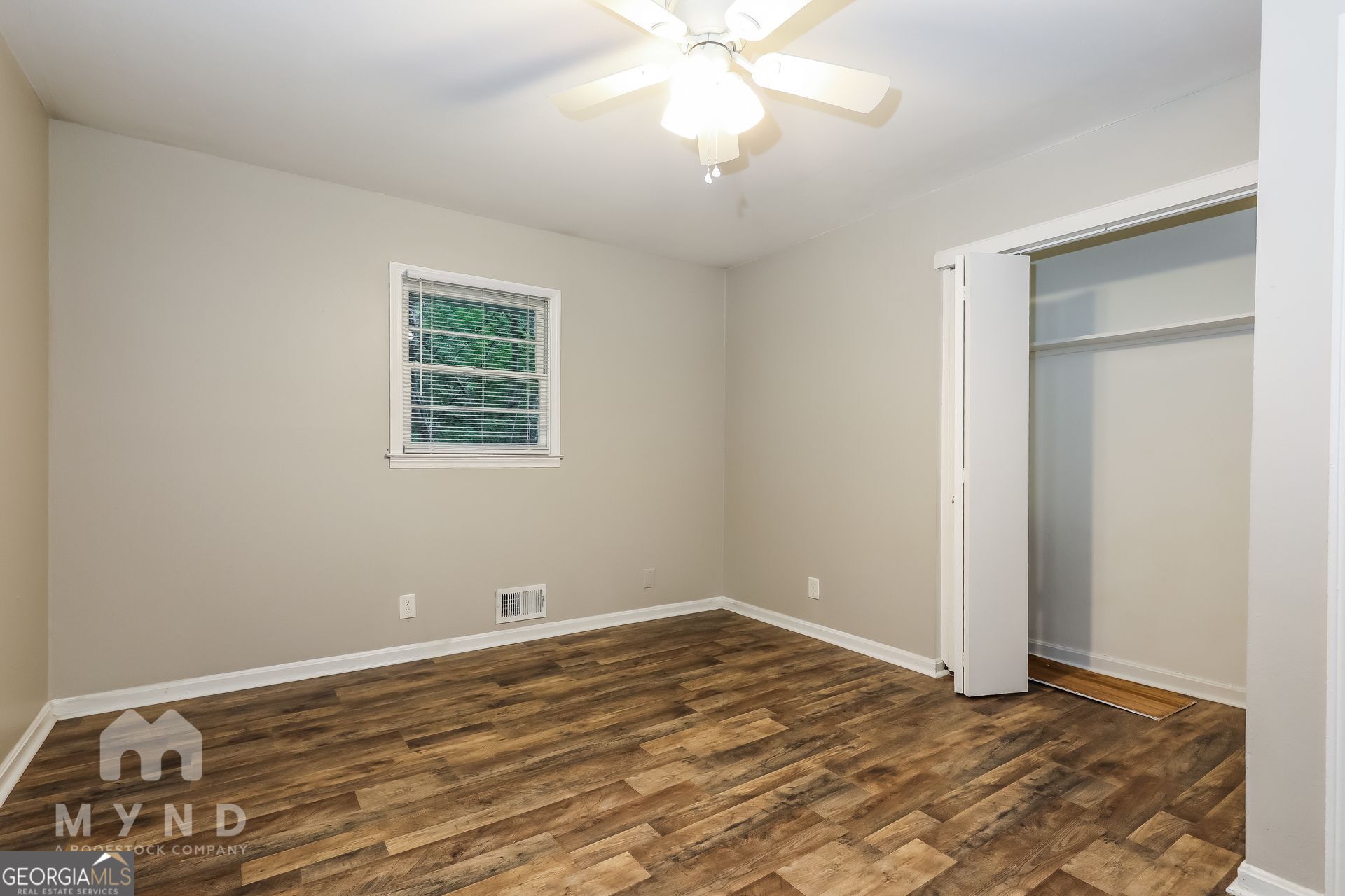 2644 Butner Road Atlanta, GA 30331 - Photo 14 of 21 a view of a room with wooden floor and closet
