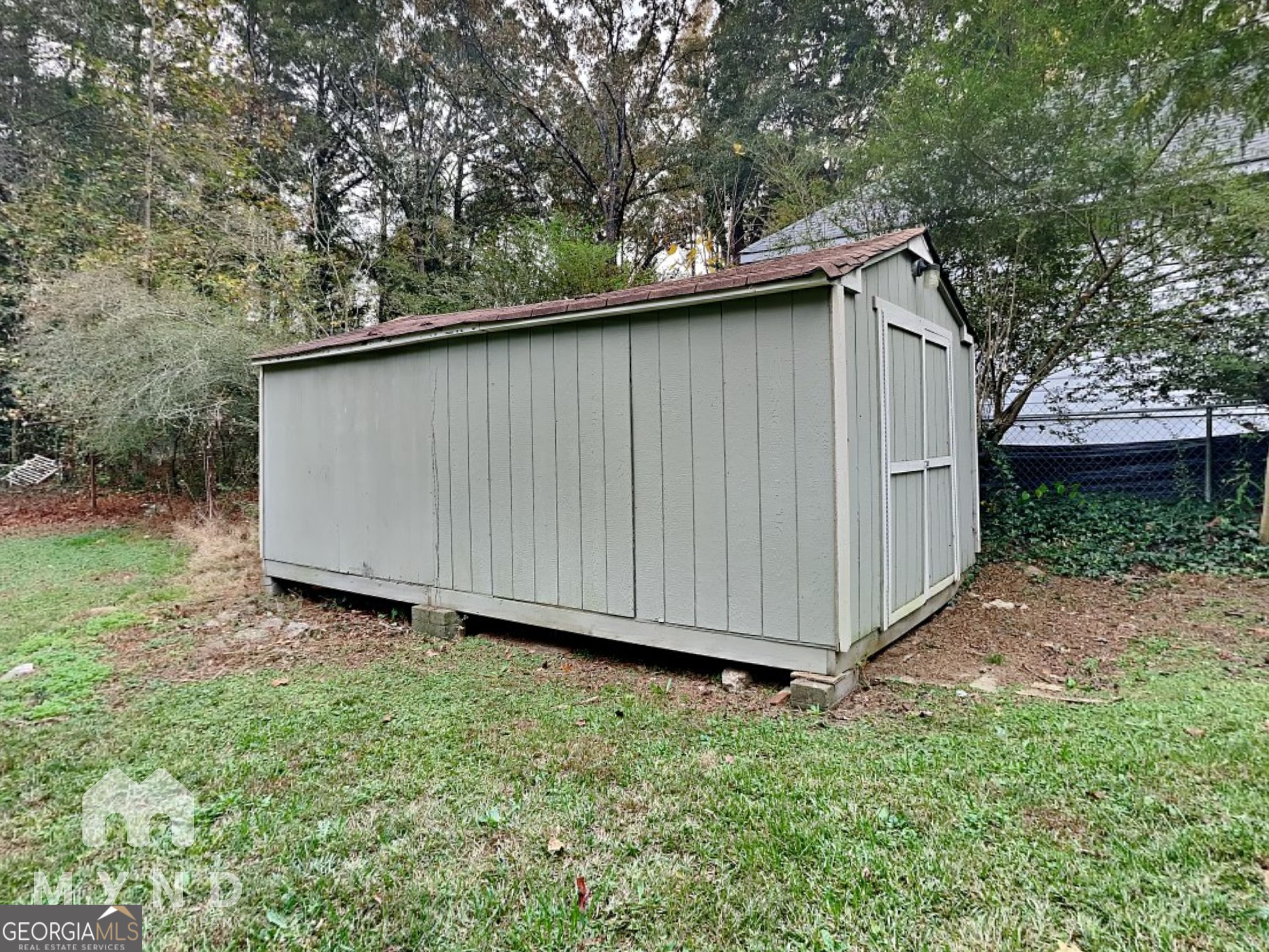 2644 Butner Road Atlanta, GA 30331 - Photo 19 of 21 a backyard of a house with lots of green space