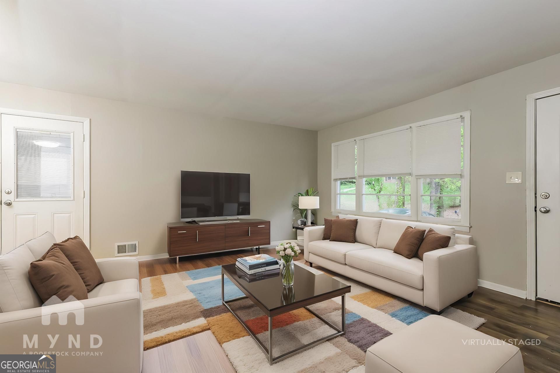 2644 Butner Road Atlanta, GA 30331 - Photo 2 of 21 a living room with furniture and a flat screen tv