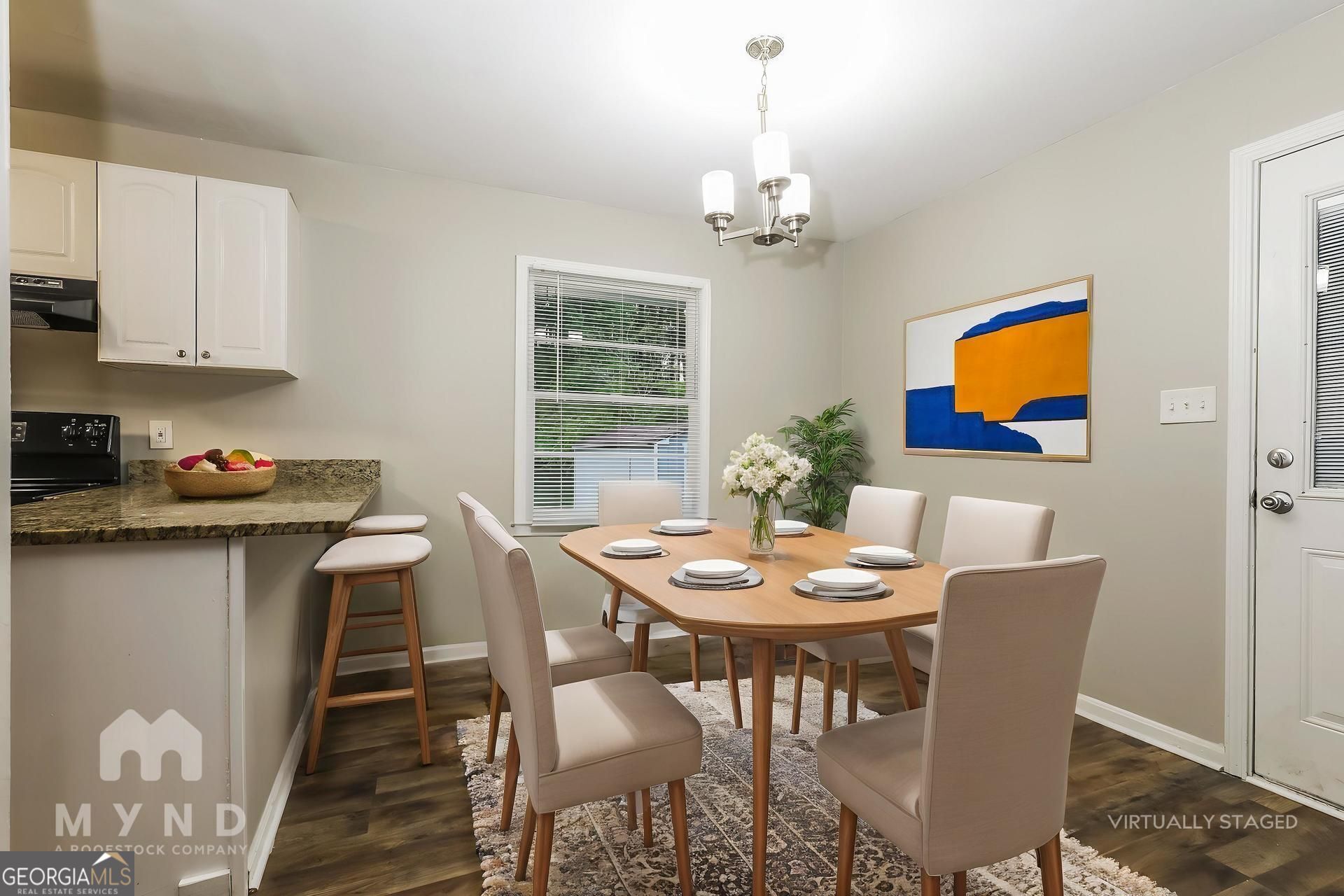 2644 Butner Road Atlanta, GA 30331 - Photo 5 of 21 a view of a dining room with furniture window and wooden floor