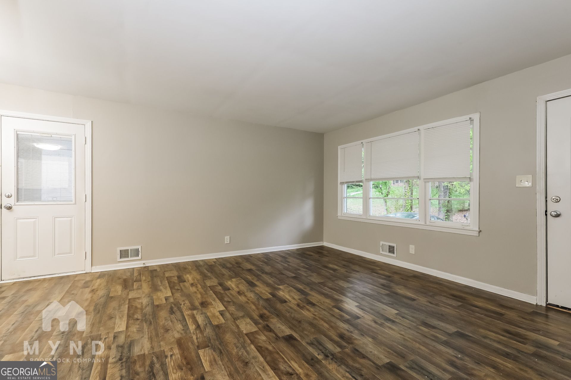 2644 Butner Road Atlanta, GA 30331 - Photo 8 of 21 a view of room with window and hardwood floor