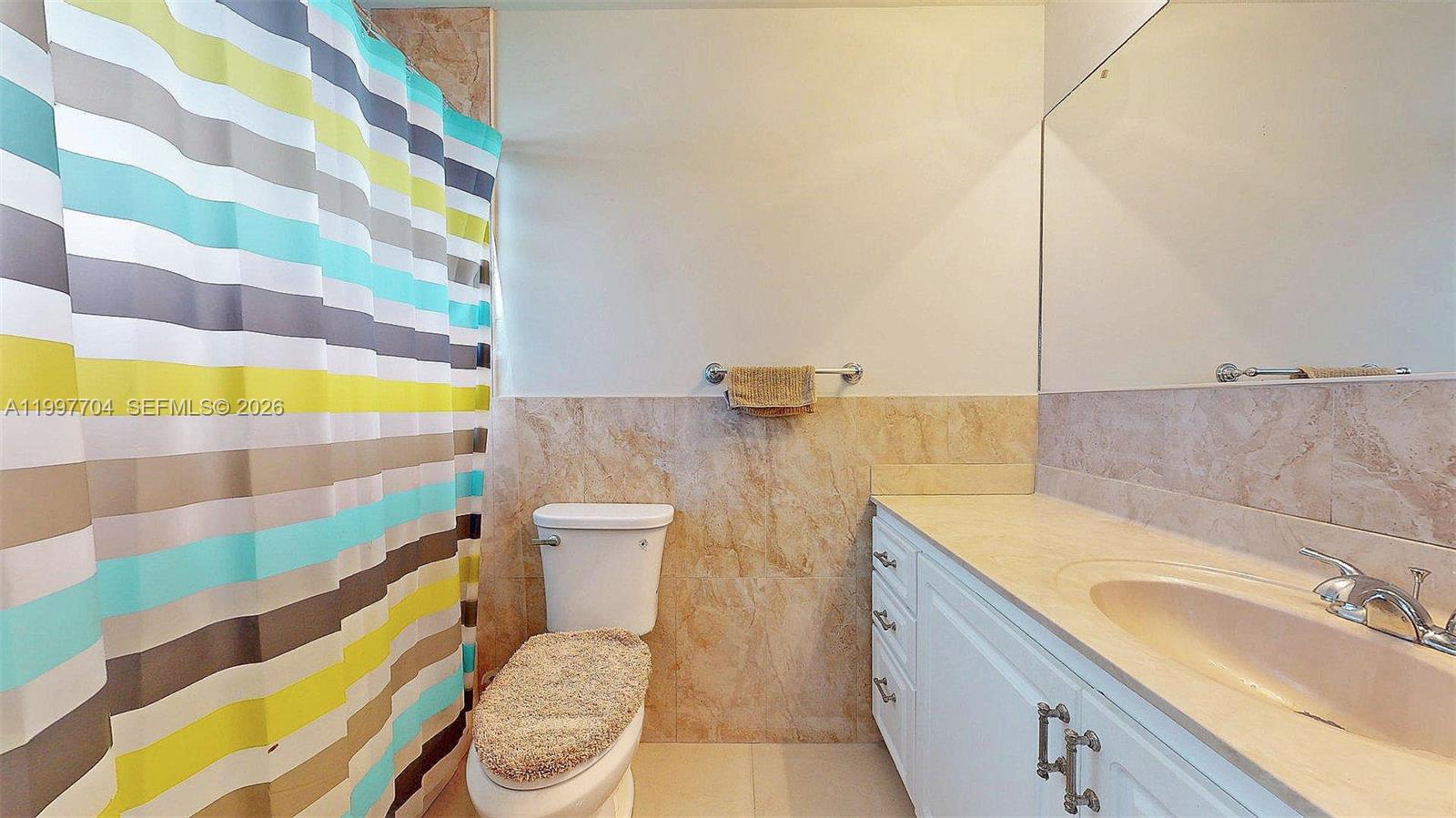 21450 Southwest 109th Court Miami, FL 33170 - Photo 23 of 43 a bathroom with a sink and a mirror