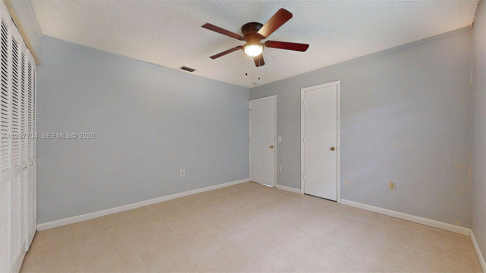 21450 Southwest 109th Court Miami, FL 33170 - Photo 37 of 43 an empty room