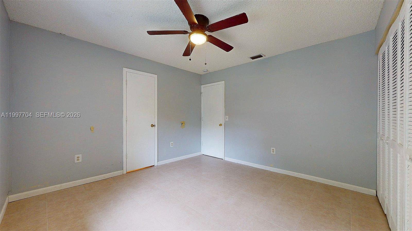 21450 Southwest 109th Court Miami, FL 33170 - Photo 9 of 43 wooden floor in an empty room