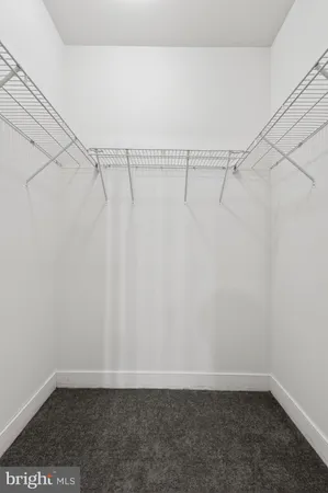 a view of a room with racks on the wall
