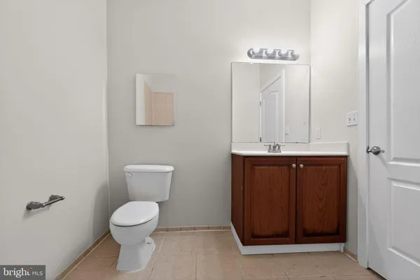a bathroom with a toilet sink