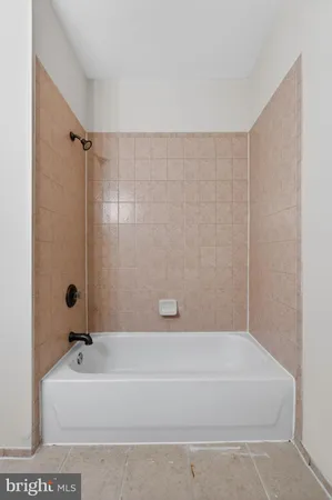 a bathroom with a bathtub