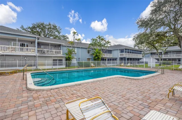 a view of a house with a swimming pool
