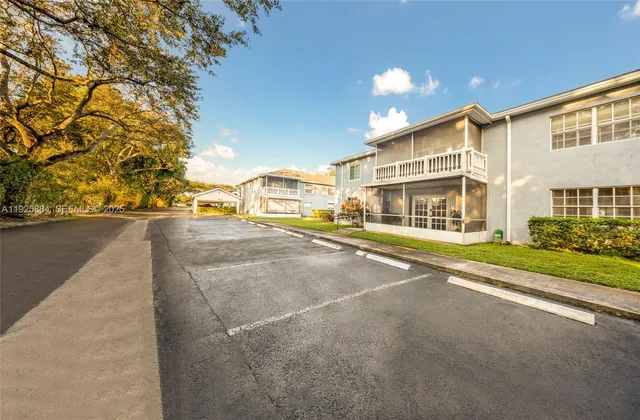 a view of street with parked cars