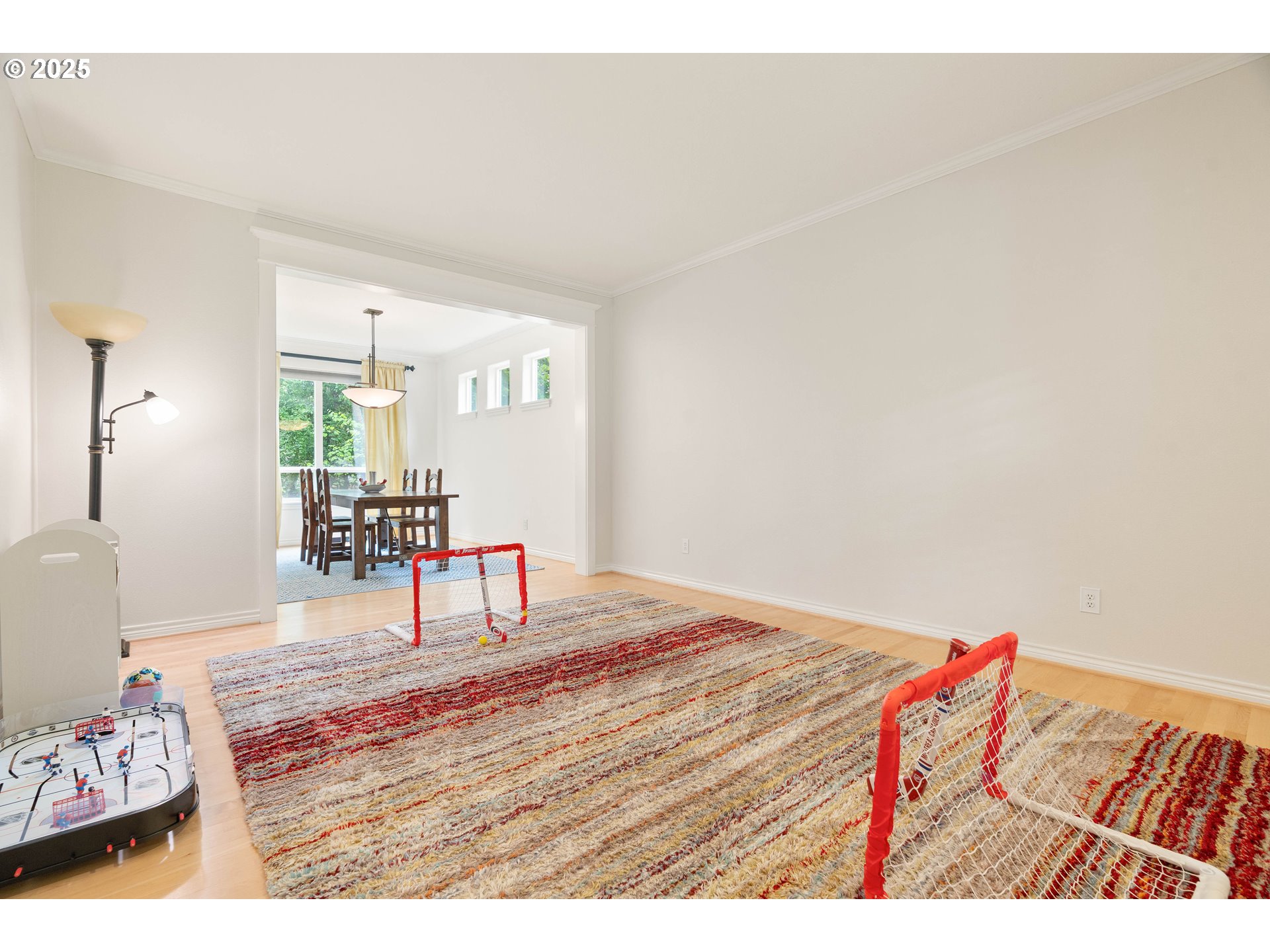 4014 Southwest 96th Avenue Portland, OR 97225 - Photo 18 of 48 a living room with furniture and a wooden floor